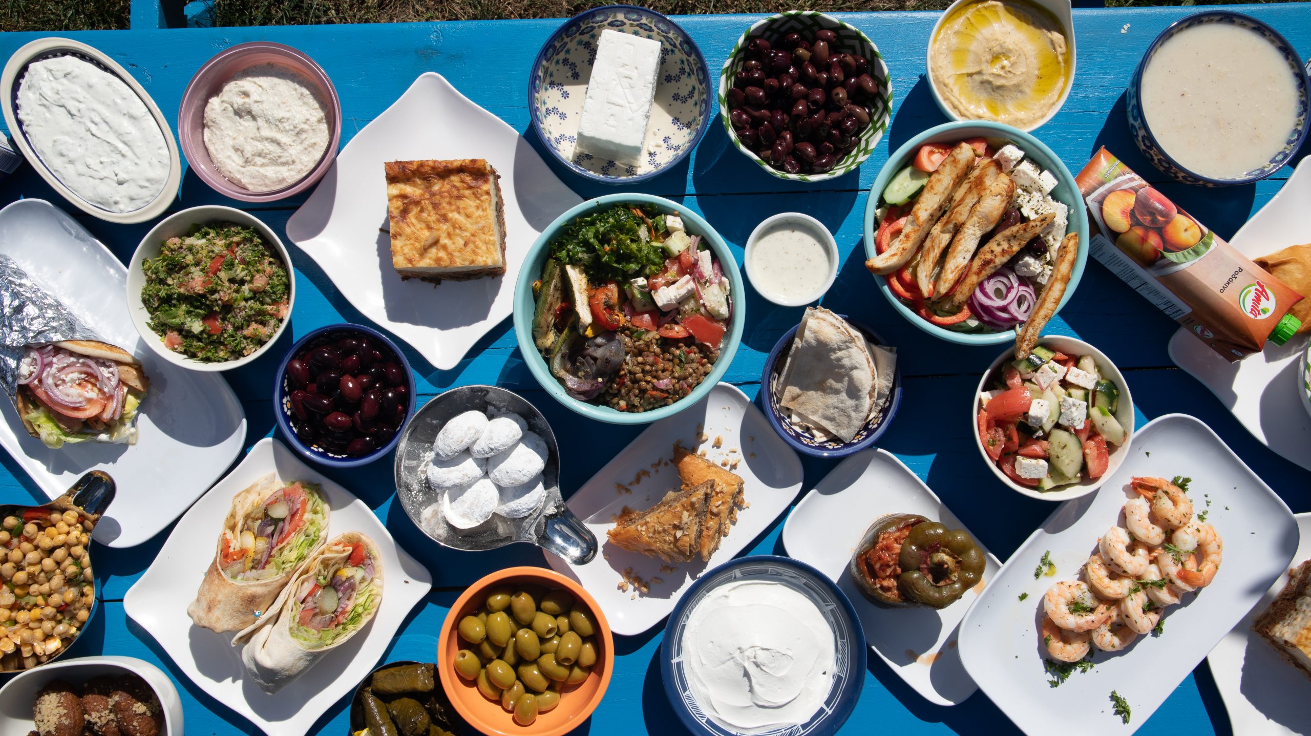 Display of various Greek foods on table