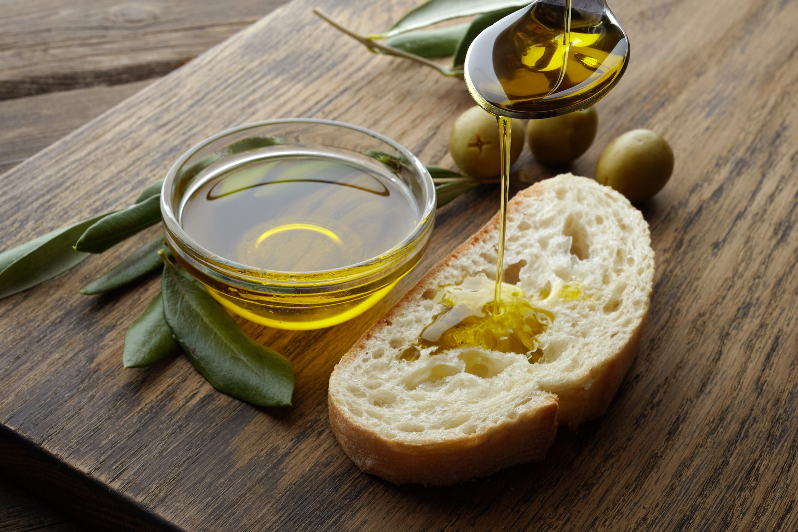 Slice of bread with drizzle of olive oil